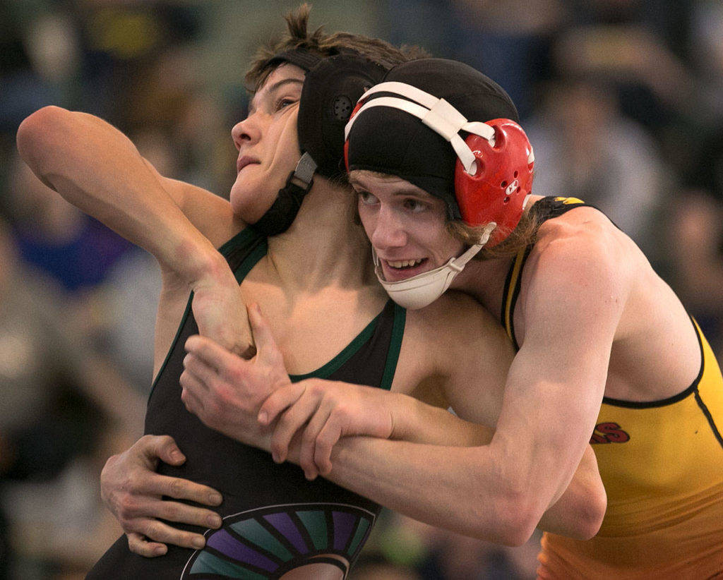 17 local wrestlers move on to state in Tacoma this weekend