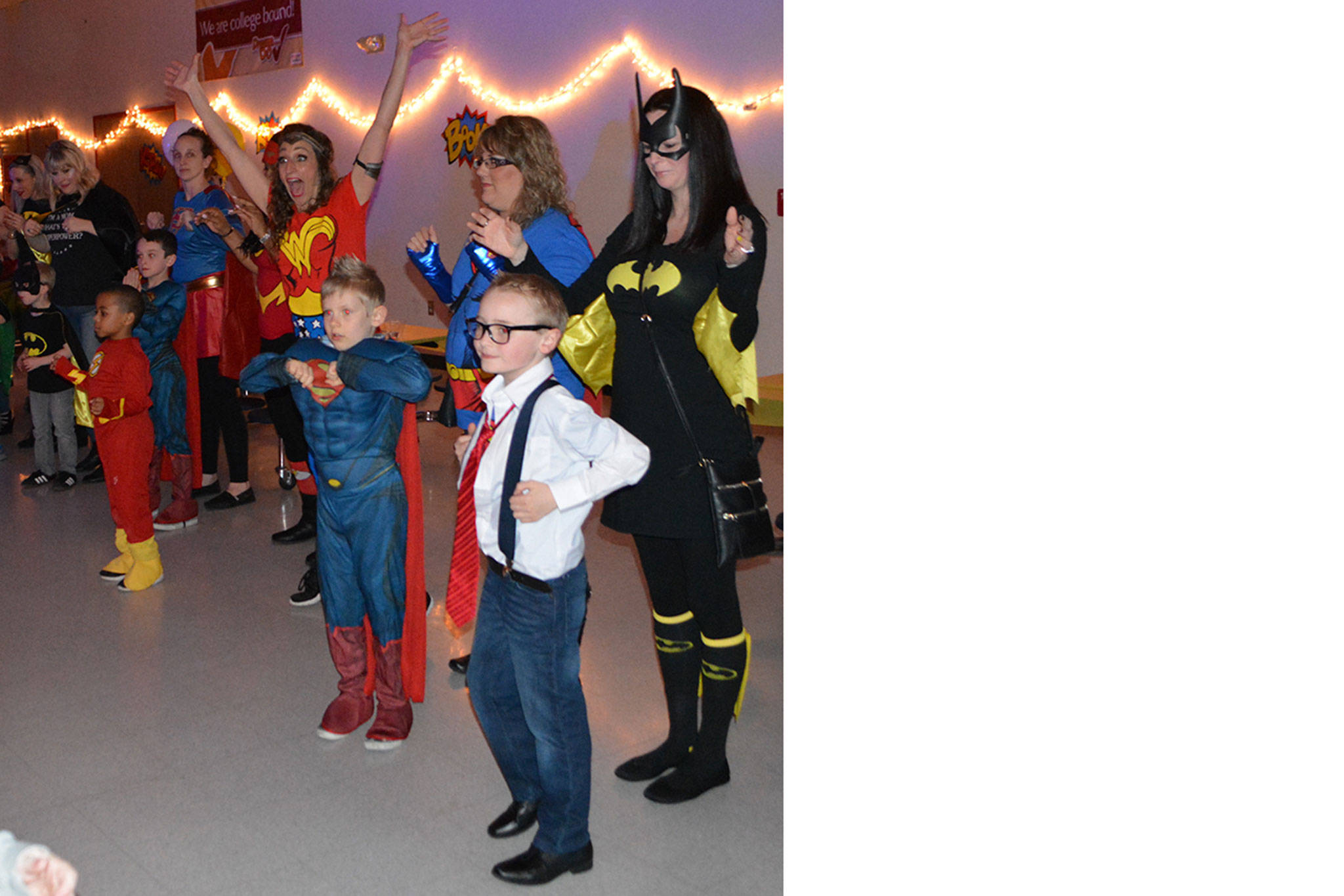 Batmen, Spidermen show moms their dance moves (slide show)
