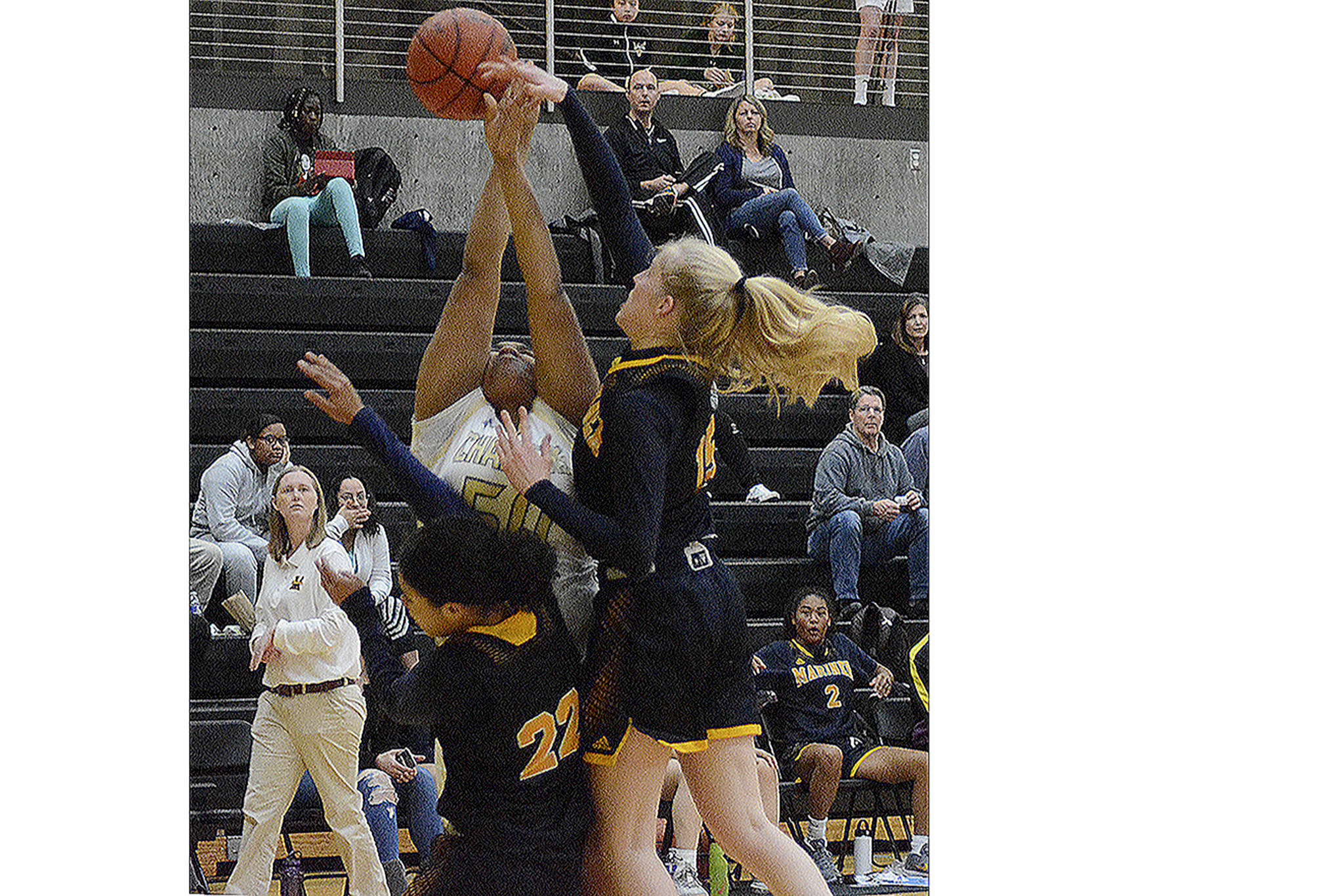 Defenses shine in early season basketball games	(slide show)