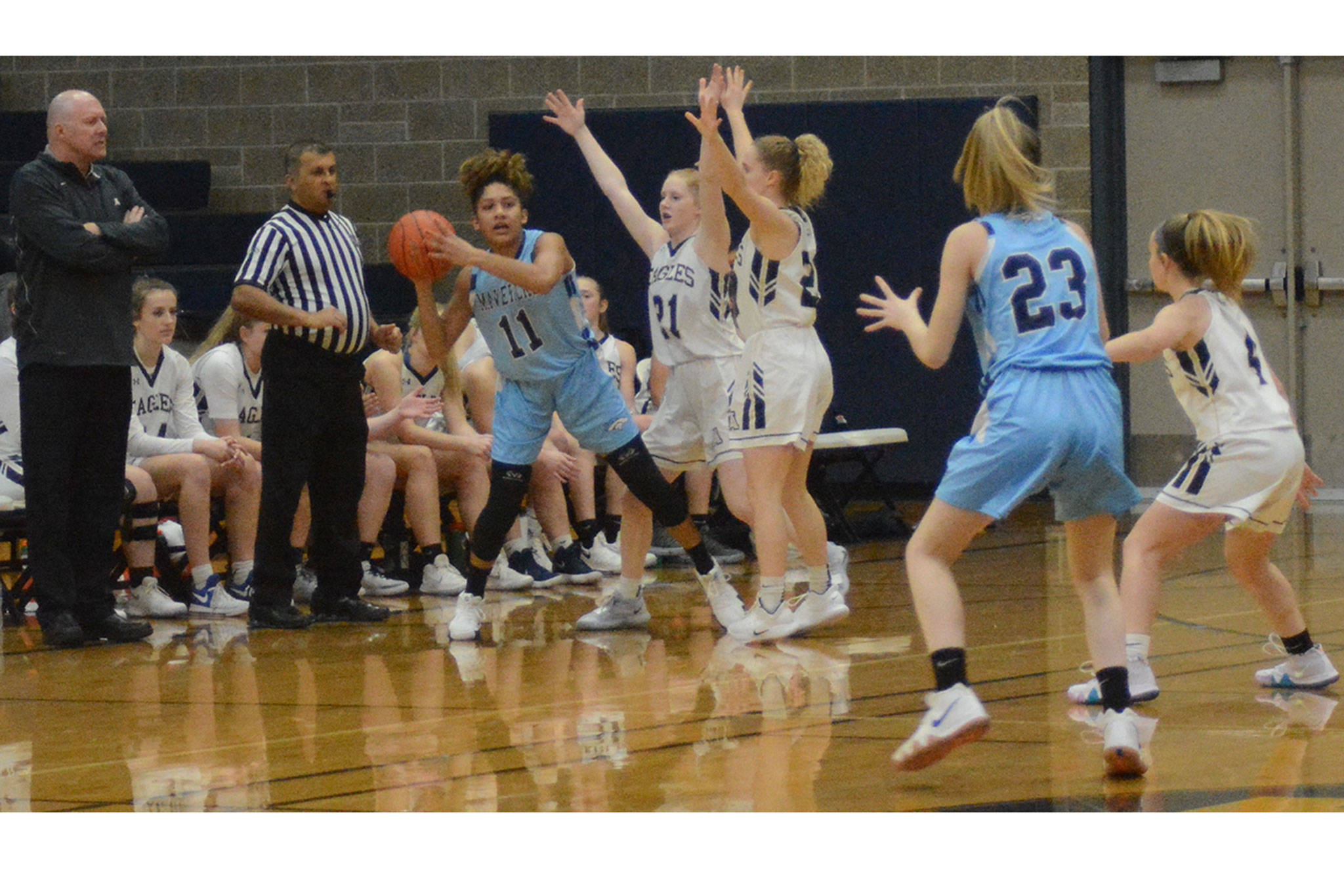 Eagle defense keys win; MG wins big; M-P wrestlers get 4 wins; 4 swim champs (slide show)