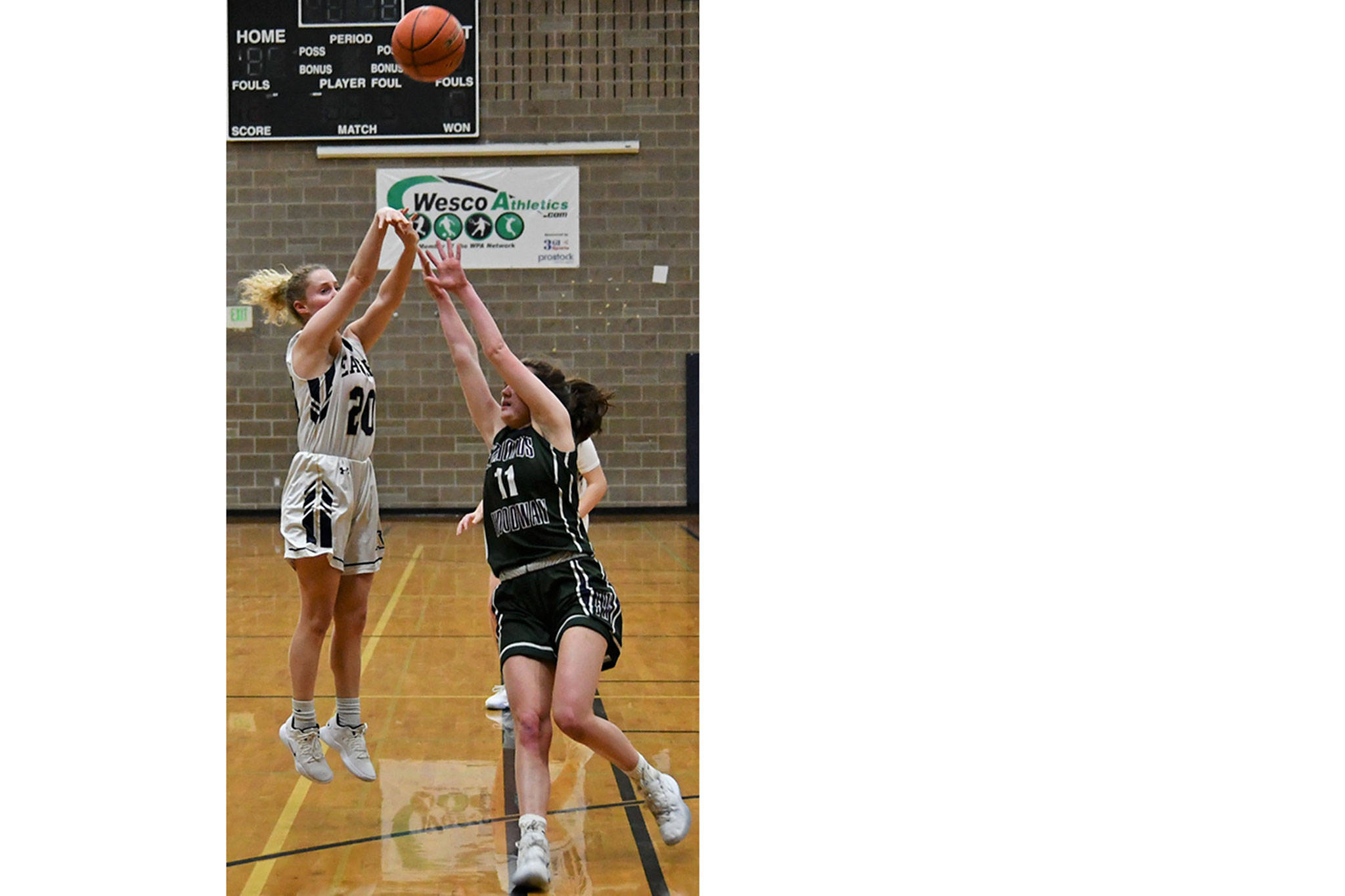 Arlington girls win thriller over E-W; wrestlers also win