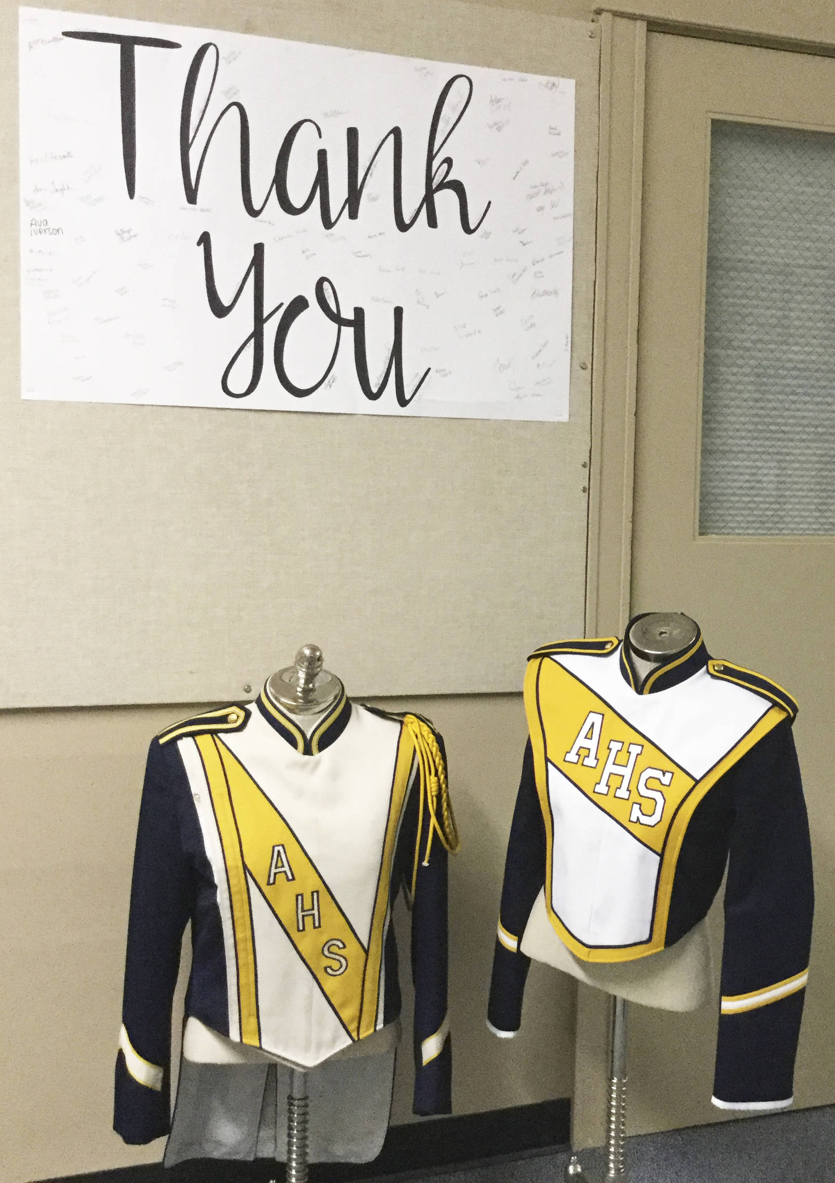 AHS marching band scores big with arrival of new uniforms