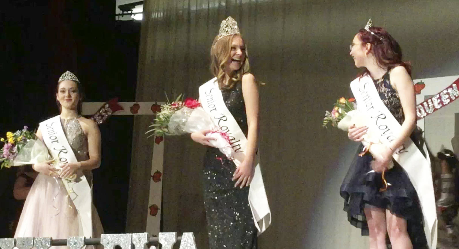 Natalia Zieroth shares a laugh of incredulity with fellow Marysville-Pilchuck High School senior Brionna Olson and Marysville Getchell senior Jael Hudson after Zieroth was named 2019 Marysville Strawberry Festival queen Saturday during the April Friesner Memorial Royalty Scholarship Pageant in the M-P auditorium. Candidates Olson and Hudson were selected as princesses.