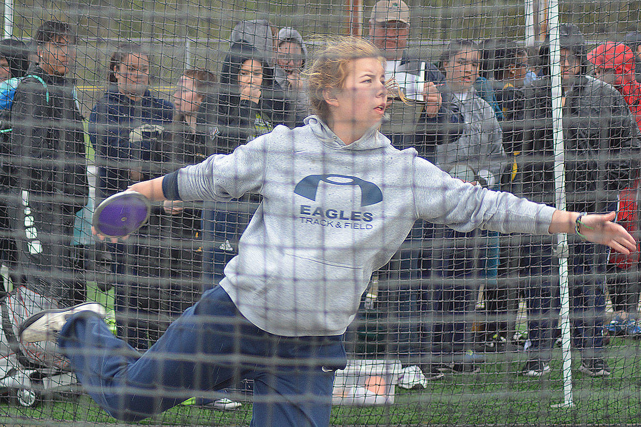 Arlington, MG excel in track; Eagles beat M-P, MG in golf; Lakewood softball keeps winning (slide show)