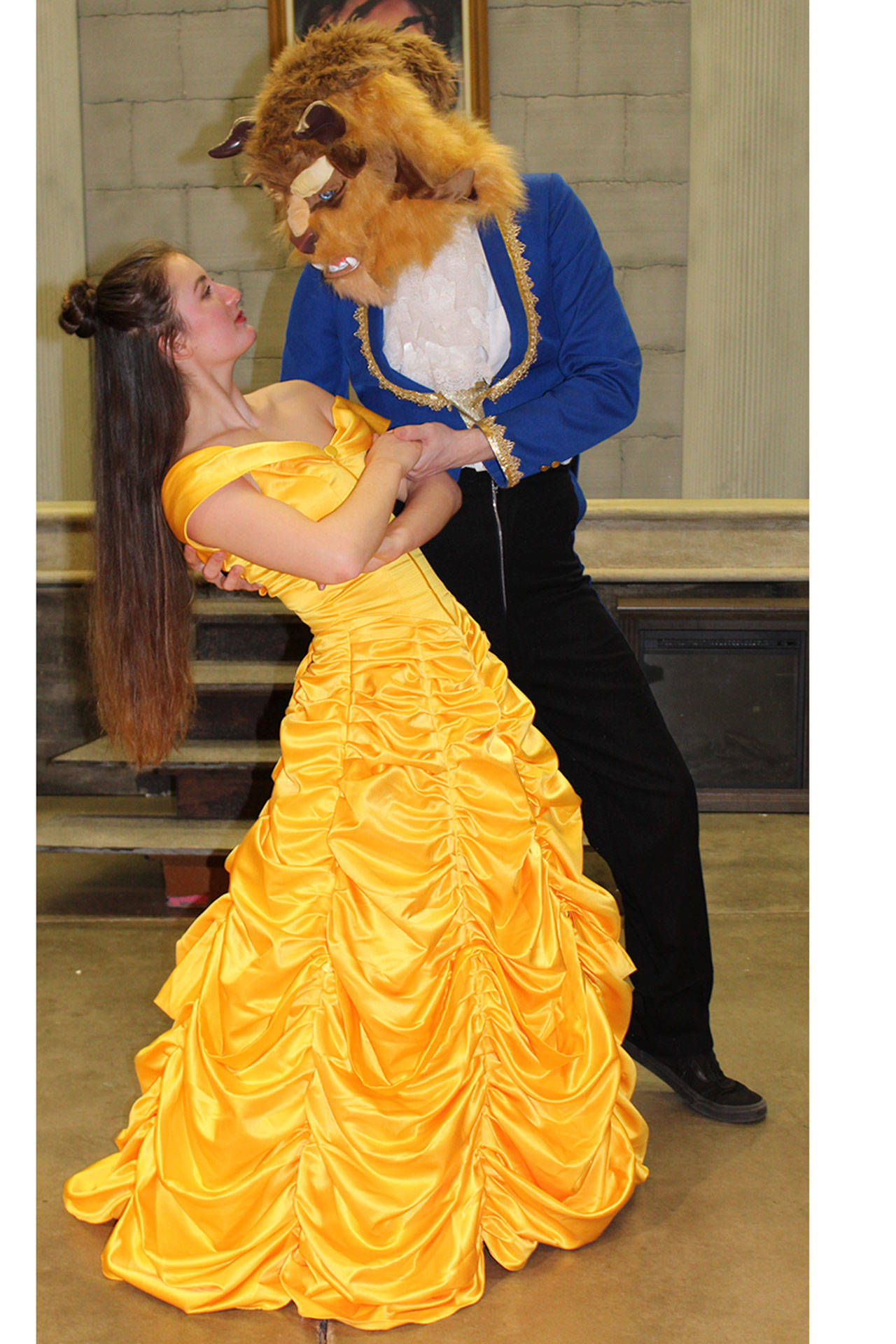 Victoria Steward as Belle and Morgan Reed as the Beast.