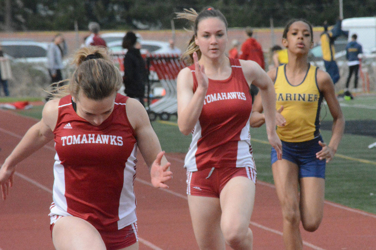 M-P splits in track; Arlington falls; Lakewood softballers edged