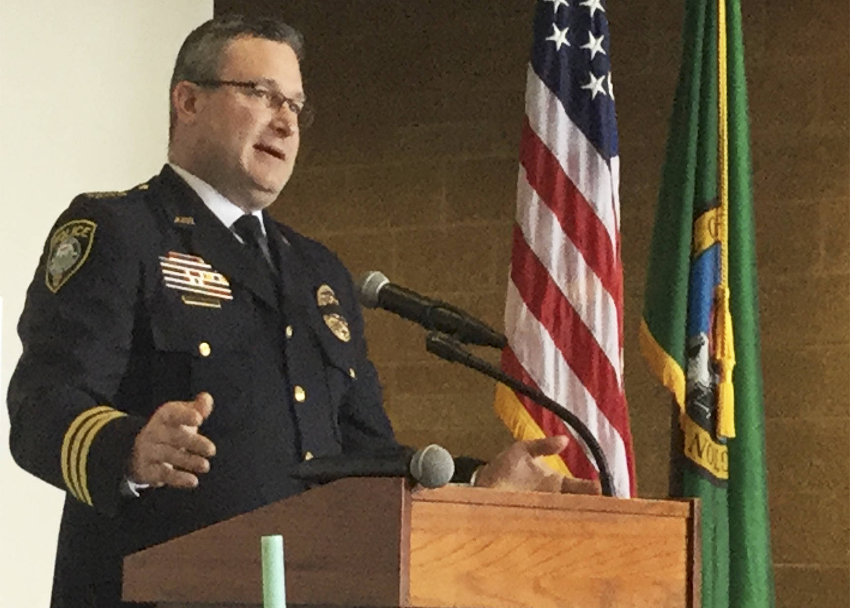 Arlington Police Chief Jonathan Ventura gives a one-year progress report on the citys Community Outreach Program at a Stilly Valley Chamber of Commerce luncheon.