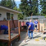 Volunteers build ramps for those in need