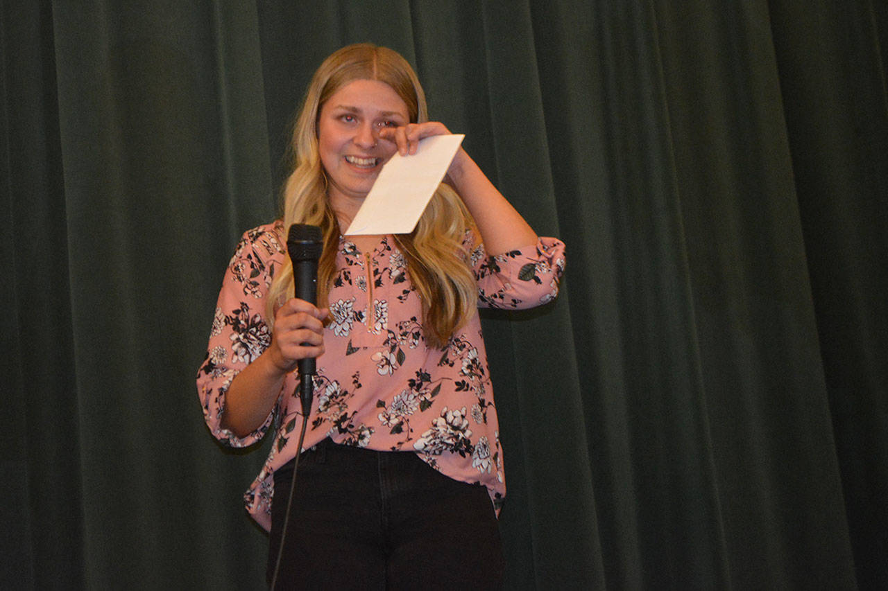 Skyleigh Morrison wipes a happy tear away after winning a $20,000 scholarship.