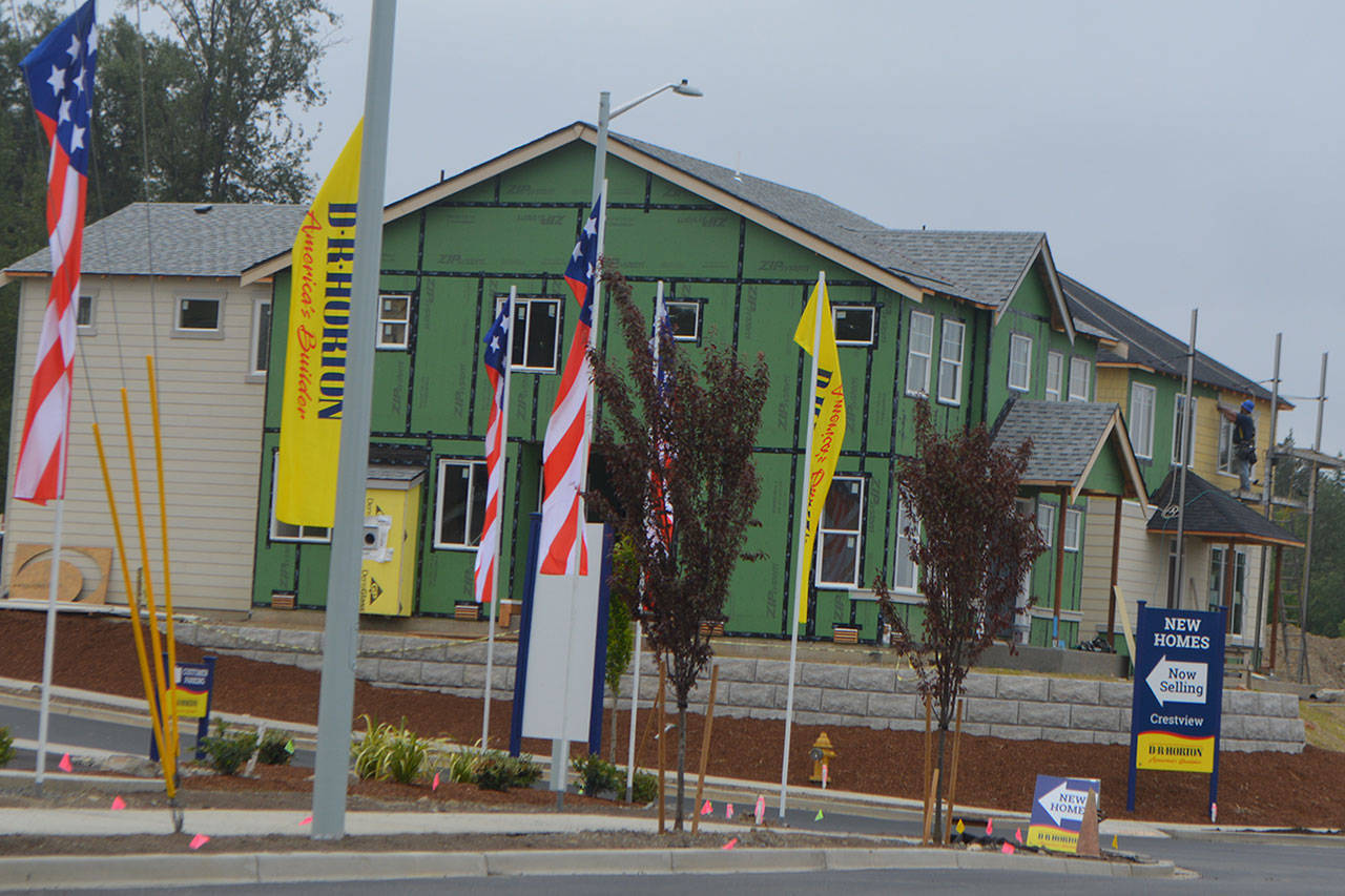 Steve Powell/Staff Photos                                 These three photographs show just a small portion of the residential developments going on at Whiskey Creek Ridge.