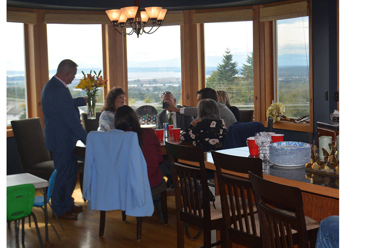 Visitors enjoy the view of Marysville from the kitchen area. (Steve Powell/Staff Photos)