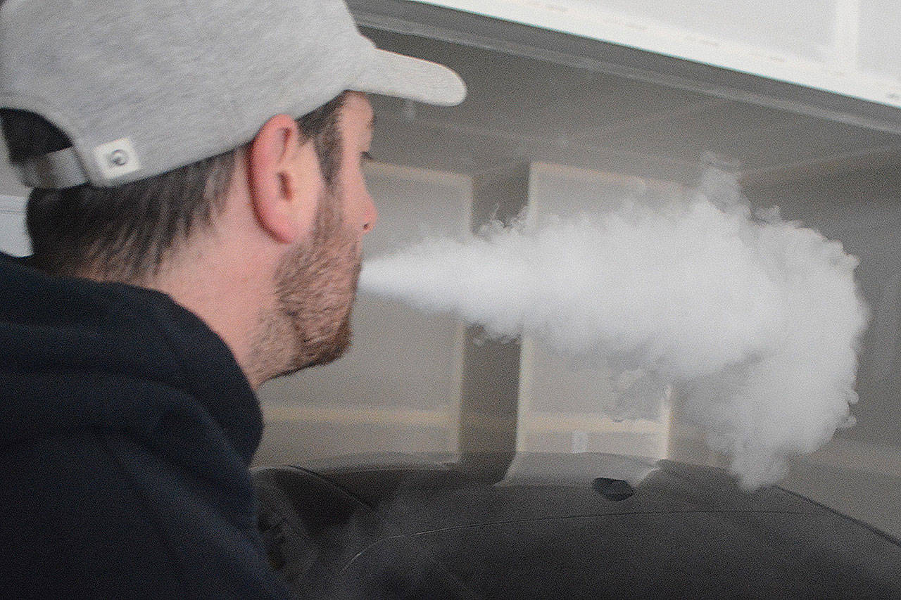 A giveaway if someone is vaping is lots of smoke. (Steve Powell/Staff Photo)
