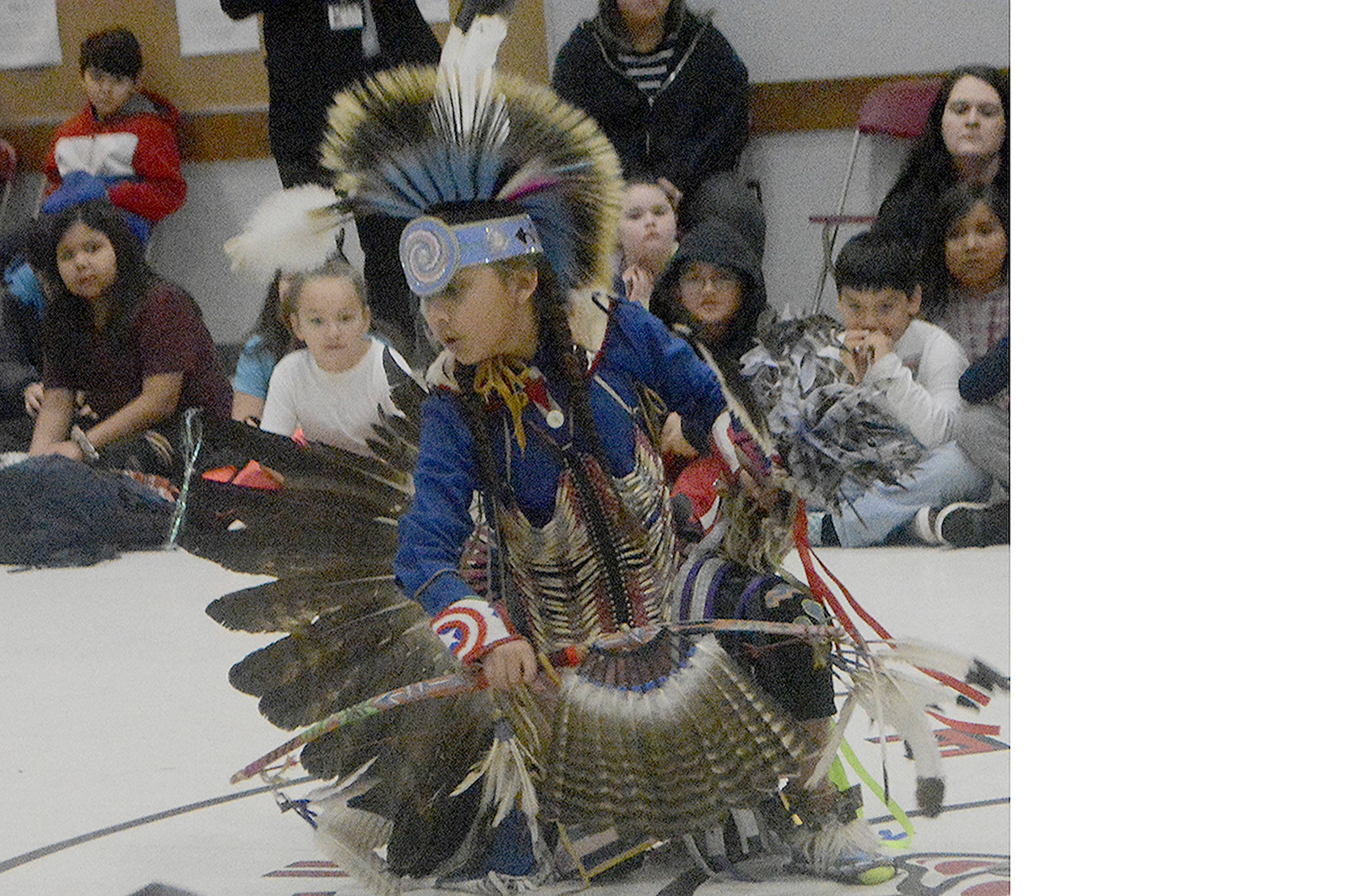 Mason dances for the crowd at Tulalip Day ceremony. (Steve Powell/Staff Photo)