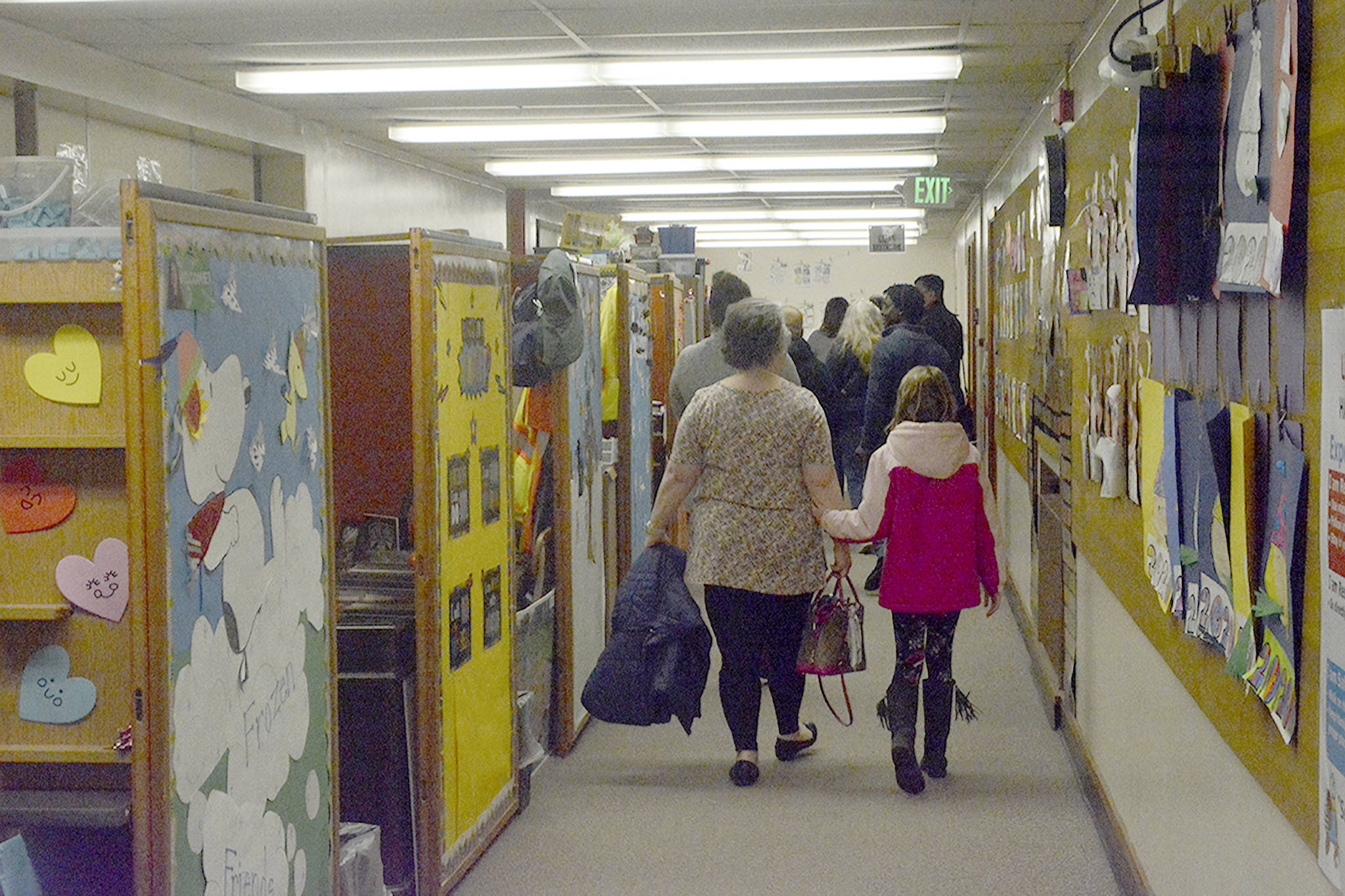 Paraeducators have their offices in a hallway.