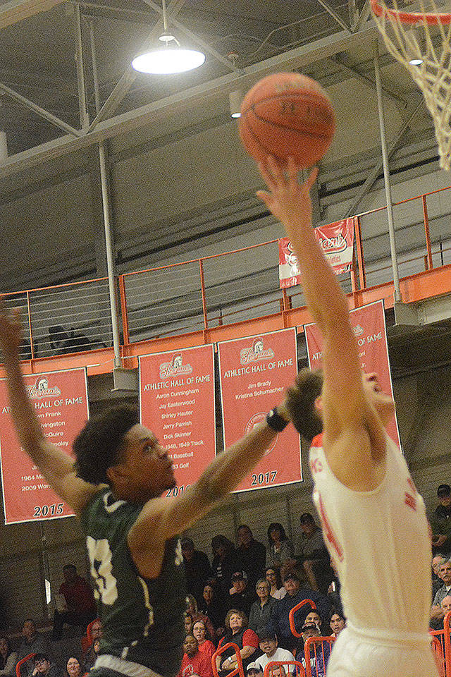 Aaron Kalab goes in for a layup against Shorecrest.