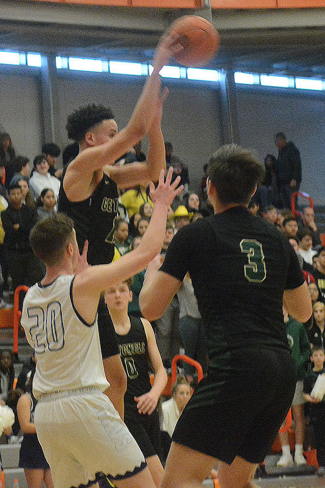 Austin Townsend throws a jump=pass to a teammate in the game against Meadowdale.