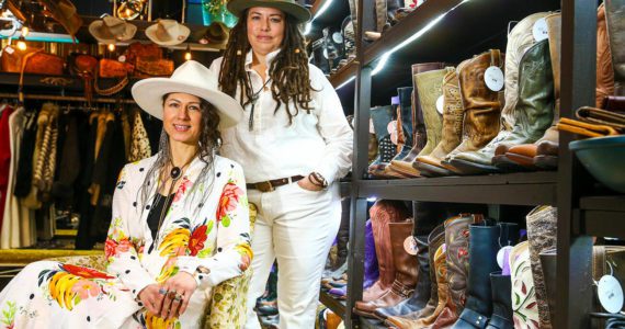 Jac Cash, left, and Jill Cash own and operate FauxyFurr in Arlington, Washington. The boutique offers customs hats and upcycled custom boots. Photographed on February 8, 2022.  (Kevin Clark / The Herald)