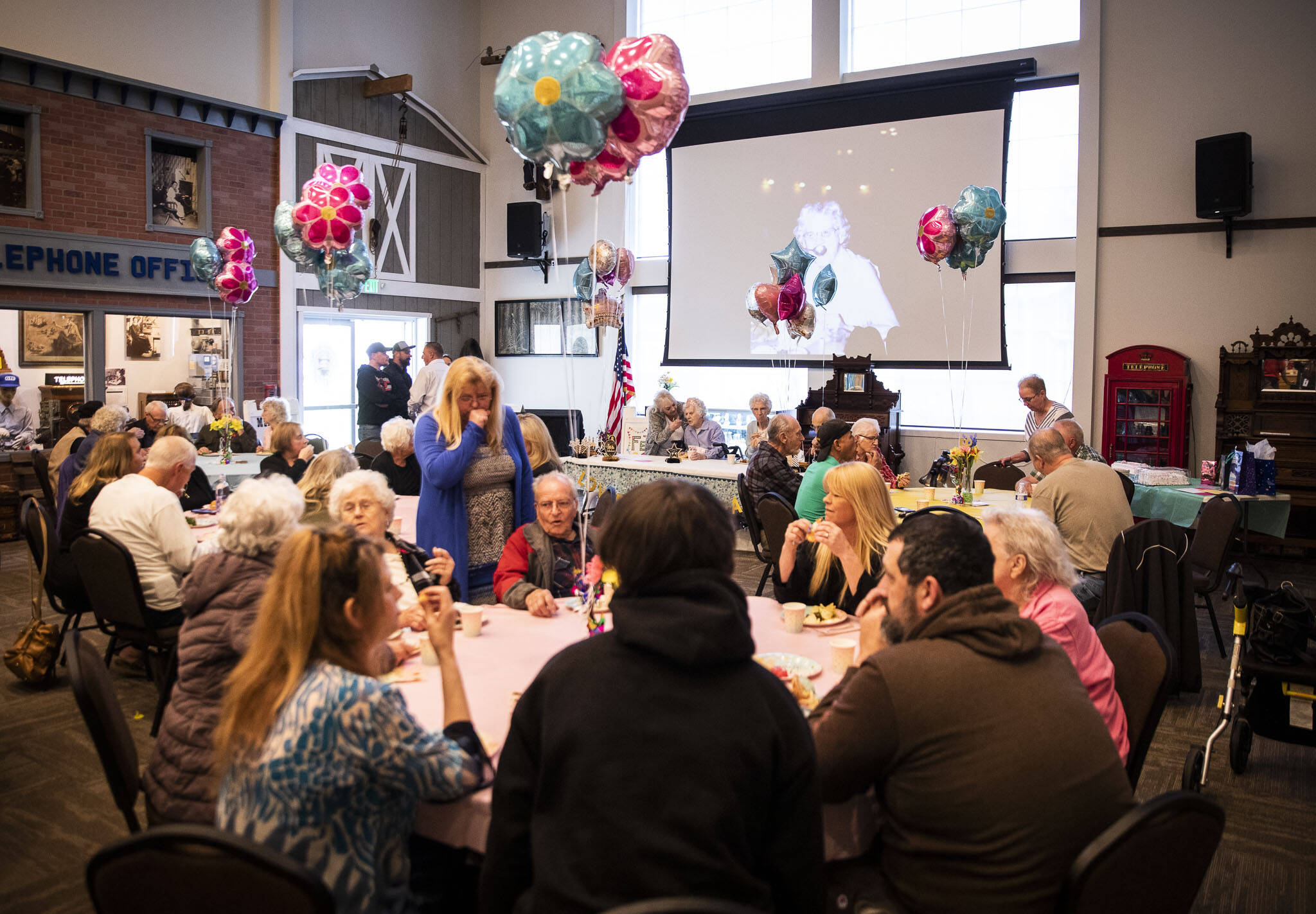 Friends and family packed the Marysville Historical Society on Armar Road for Ferne Ullestad’s party. (Olivia Vanni / The Herald)