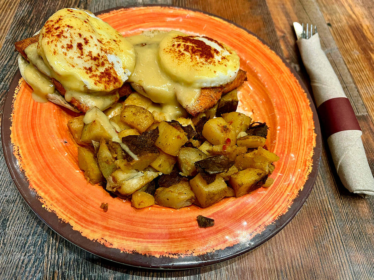Salmon Eggs Benedict with a side of skillet potatoes, $16, at Quil Ceda Creek Casino in Tulalip, where breakfast with numerous menu choices is served 24/7. (Andrea Brown / The Herald)